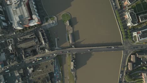 aerial view of sarsfield swivel bridge during sunrise in limerick, ireland.