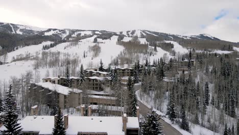 flying up a ski resort area in aspen, colorado.