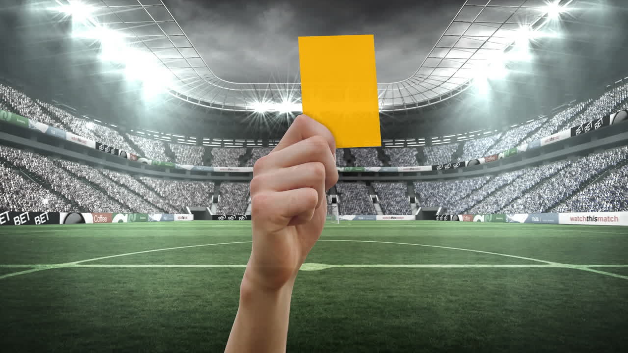 Animation of hand holding yellow card over stadium
