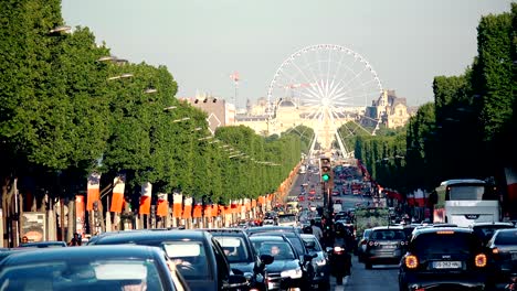 traffic on avenues des champs elysees. the champs-elysees forms part of the axe historique in paris, france