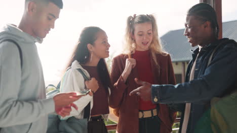 group of students talking and using phone