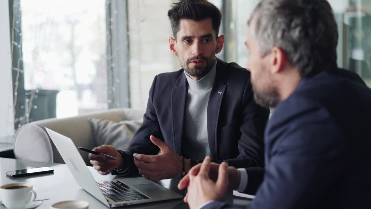 Business Discussion in a Cafe