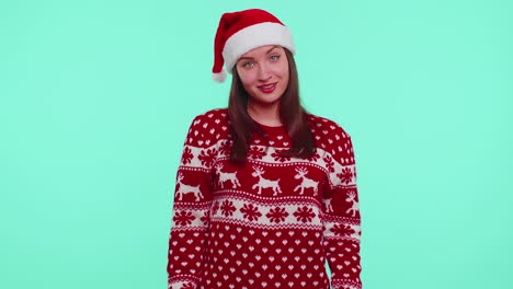 adult happy cute girl in christmas sweater listening music, dancing disco fooling around having fun