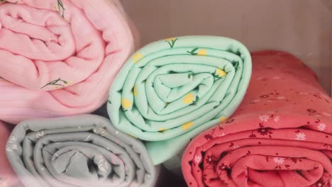 rolled pastel floral fabrics