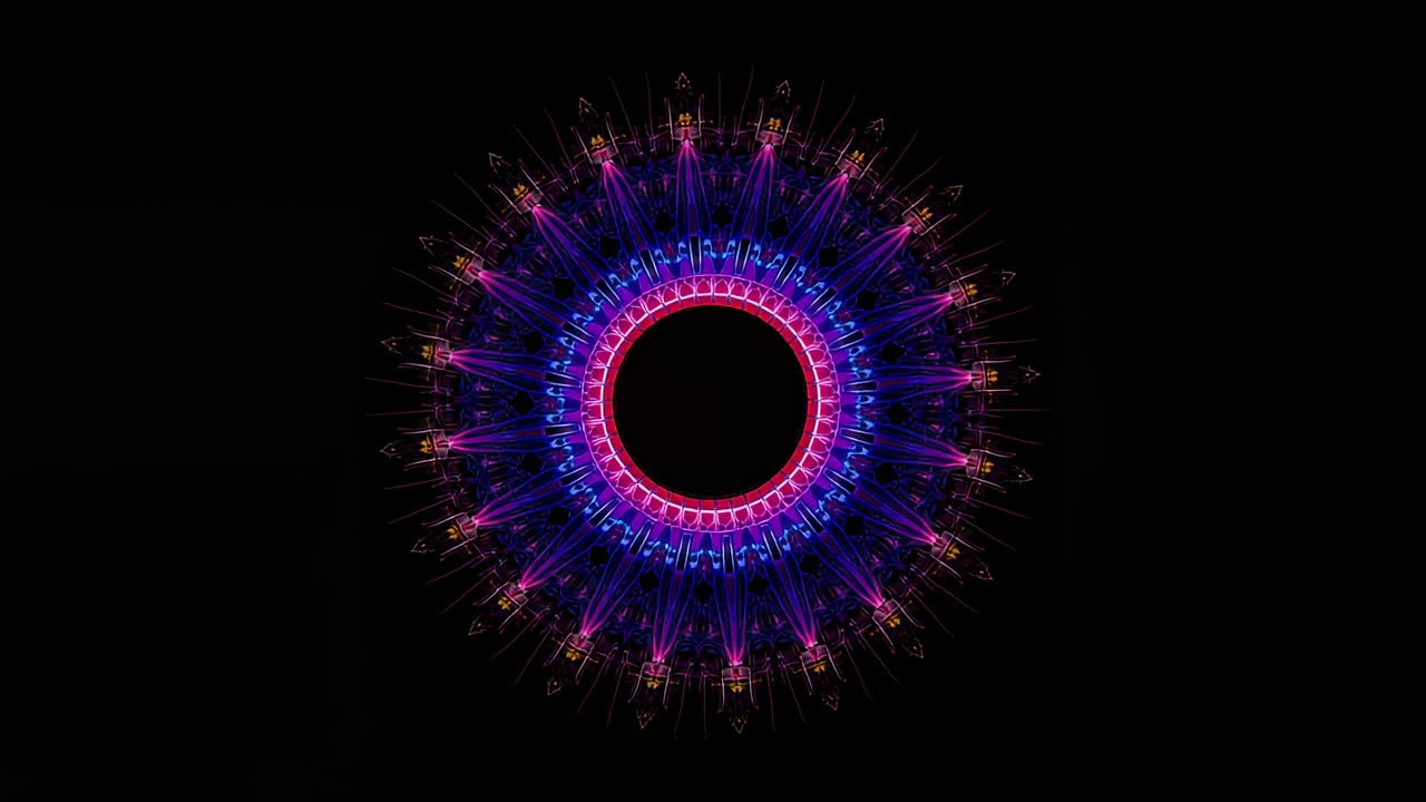 Starting digital neon radial mandala rotating clockwise on black canvas, pulsing luminescence
