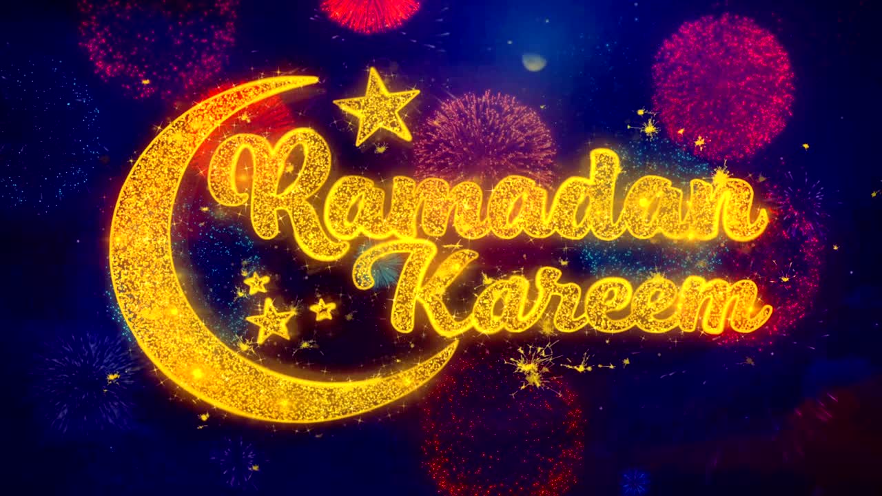 il testo del desiderio di ramadan kareem sulle particelle colorate dell'esplosione dei fuochi d'artificio.