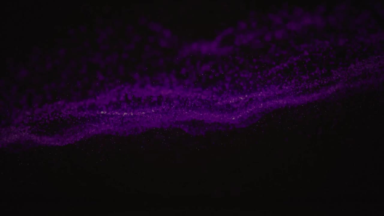 Animatie van een paarse golf van vlekken op zwarte achtergrond