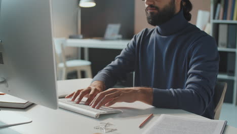 handsome man working in office
