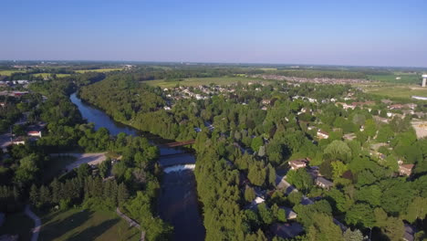 Incredible-aerial-view-of-a-small-town-with-a-river-in-rural-Ontario