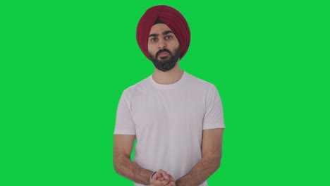 Hombre-Indio-Sikh-Enojado-Mirando-Pantalla-Verde