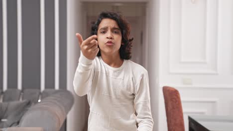 Frustrated-and-angry-Indian-kid-boy-shouting-on-someone