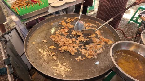 cooking process of a street food dish.