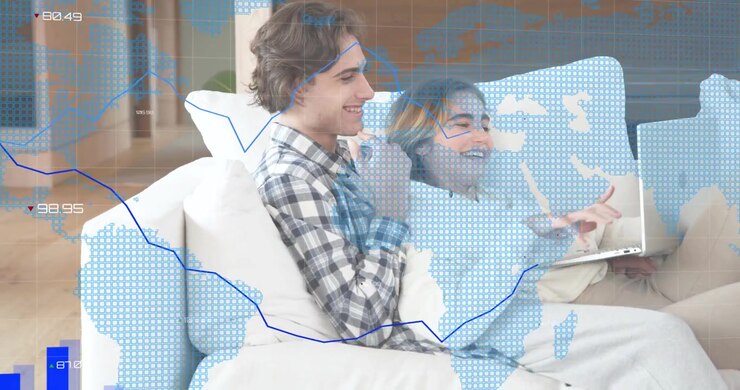 Couple typing on laptop while animated bar graphs rising around screen during business data review