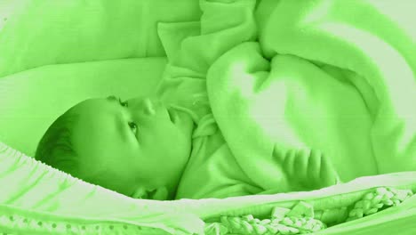 little baby in a green film