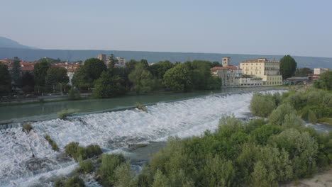 Flying-over-Ivrea-river-and-waterfalls