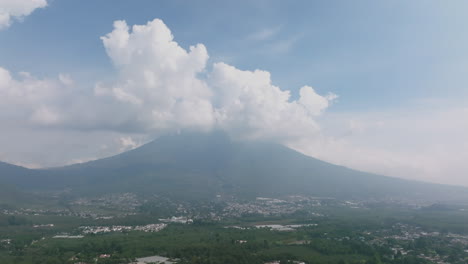 Aerial-footage-flying-over-the-city-of-Antigua-with-Volcan-de-Agua-in-the-background