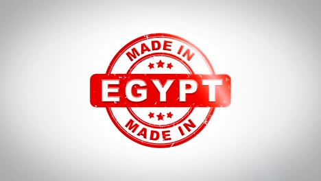 hecho en egipto firmado estampado texto animación de sello de madera. tinta roja en papel blanco limpio fondo de superficie con fondo matte verde incluido.