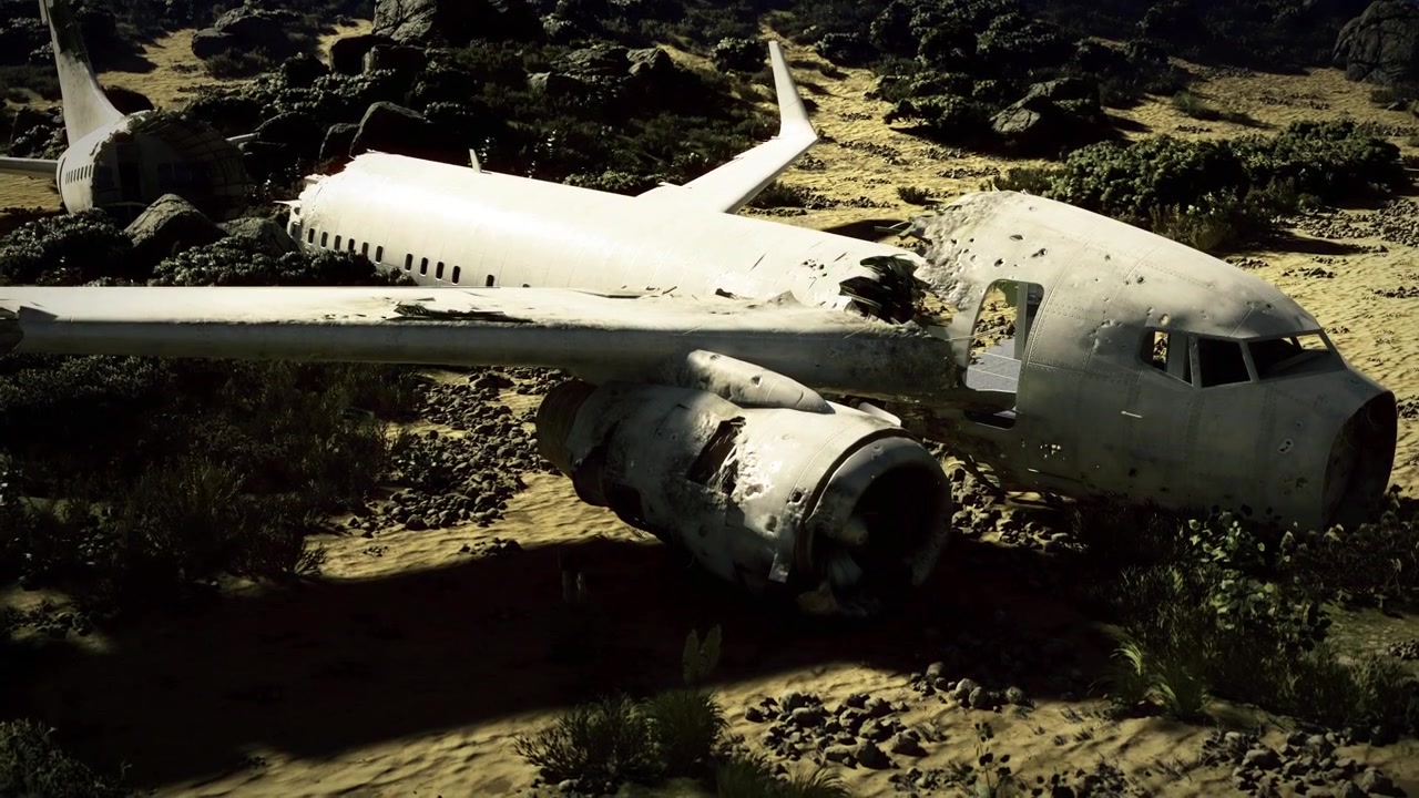 Prospettiva dall'alto che mostra un velivolo distrutto in un paesaggio roccioso.