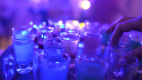 bartender pouring drink (party background)