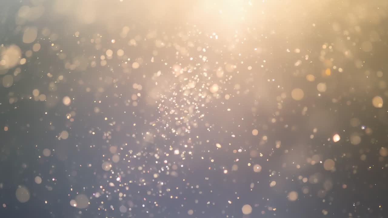 Fading warm golden light beam revealing suspended dust particles drifting in dim interior space