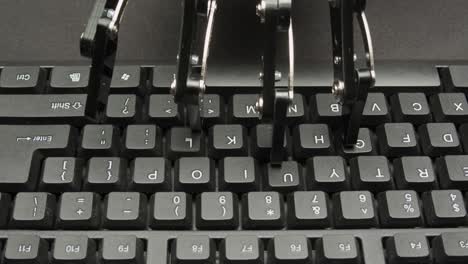 robot typing on a keyboard