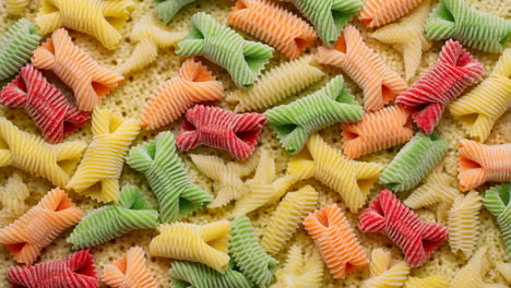 a vibrant close-up of colorful dry pasta shapes