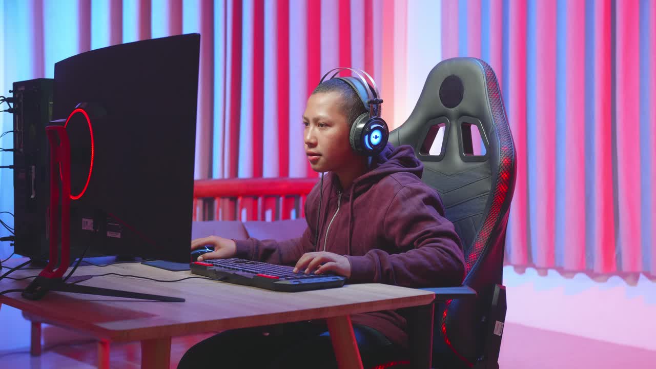 Teenager Gaming at Night