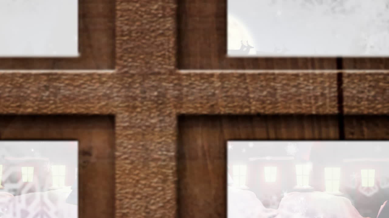 창문을 통해 보이는 크리스마스 장식과 함께 겨울 풍경의 애니메이션