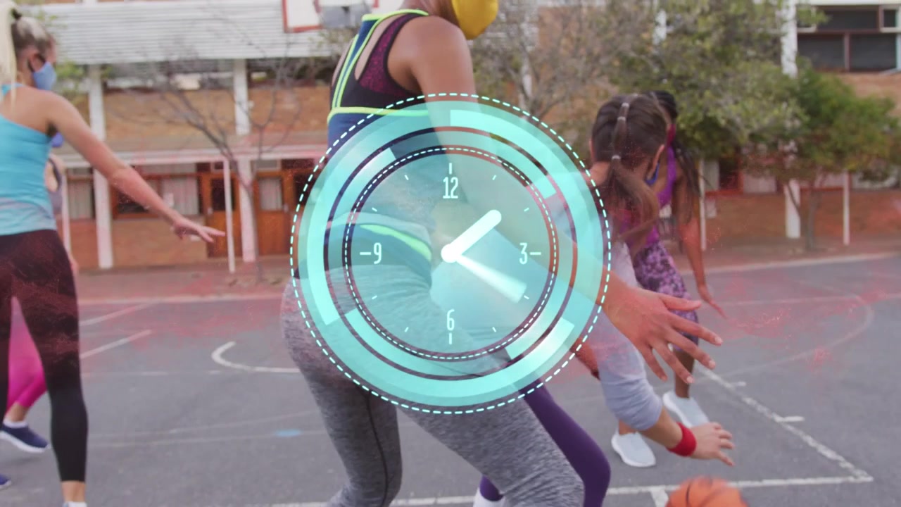 Group of Women Playing Basketball on Outdoor Court