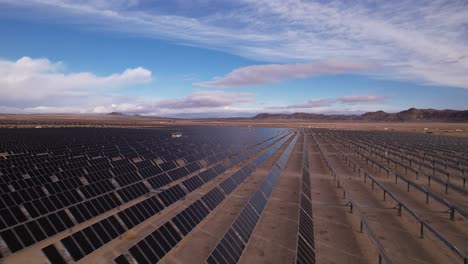 Aerial-forward-view-over-solar-panels-next-to-Joshua-Tree-national-park