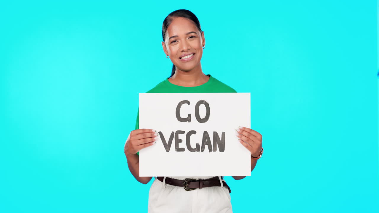Young woman, go vegan poster