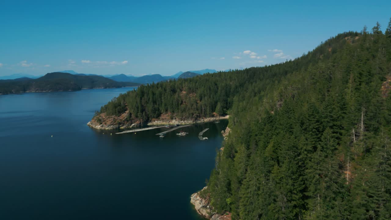 aerail shot over Read Island revealing an oyster farm and the shoreline, Discovery Islands between the Strait of Georgia and Johnstone Strait, British Columbia, Canada