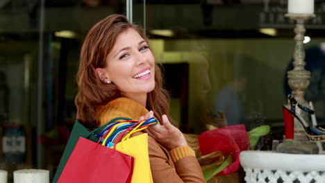 Pretty-woman-looking-at-shoes-while-shopping