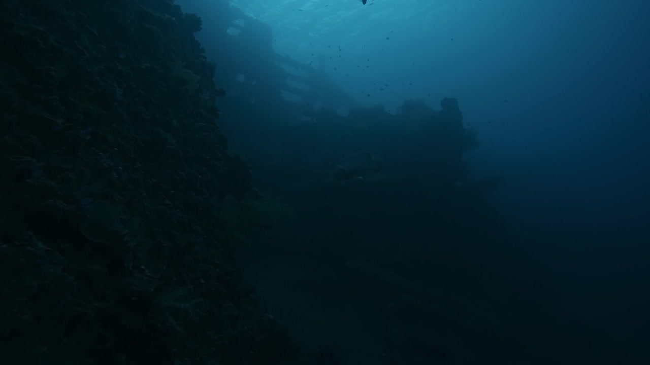 USAT Liberty Shipwreck closeup, underwater super slow mo