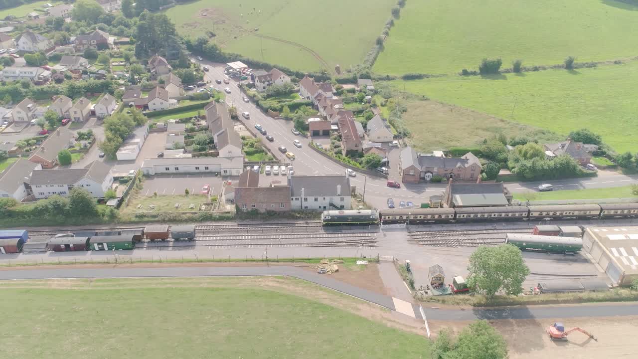 Aerial view of a train station in a village
