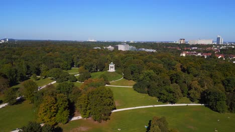 Stunning-aerial-top-view-flight-Monopteros
English-Garden-Munich-Germany-Bavarian,-summer-sunny-blue-sky-day-23