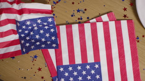 looking down on close up of napkins patterned with american stars and stripes flag at party celebrating 4th july independence day 1