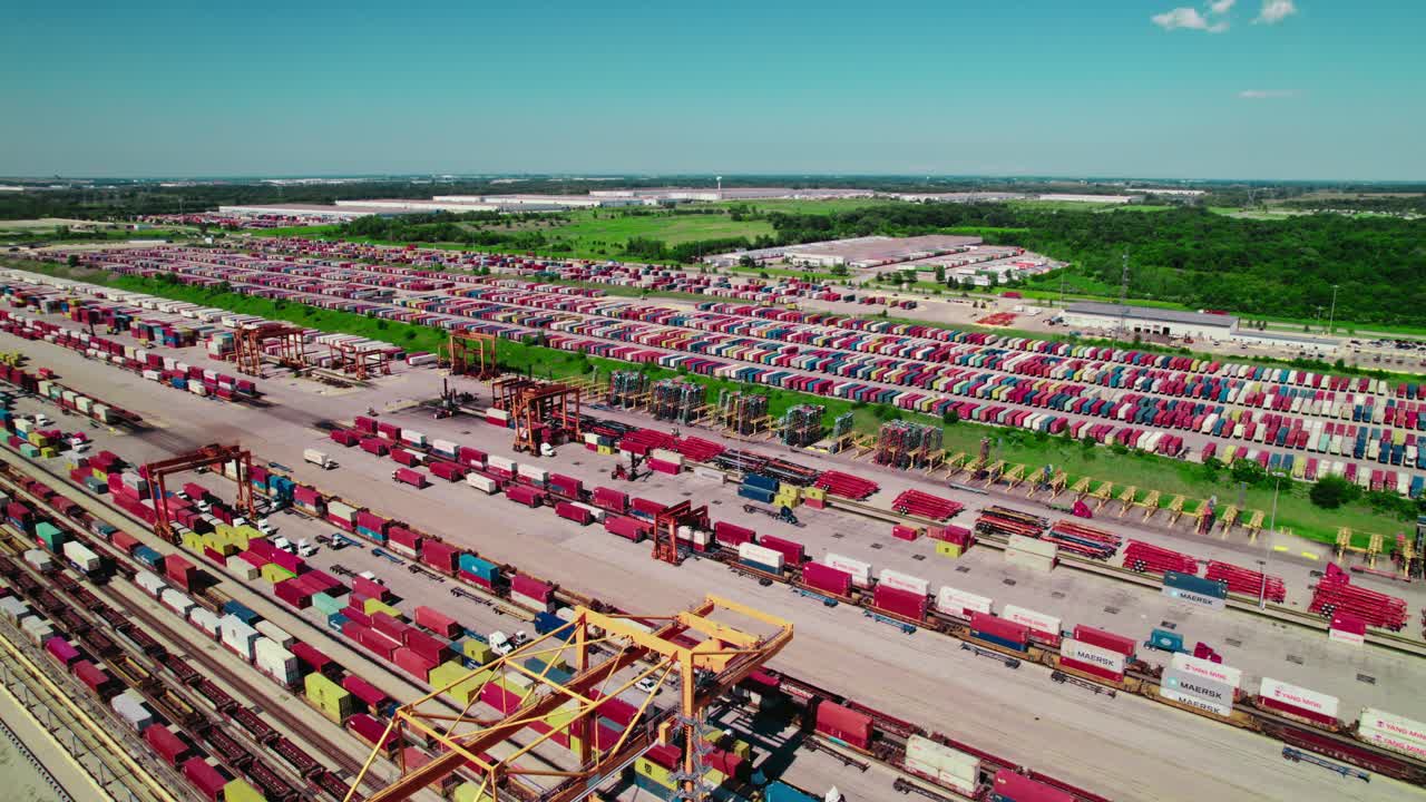 Drone view of containers and a car hauling company at a railroad terminal near Chicago.