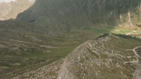 high-speed fpv drone descends near gitschberg, italy, flying close to mountain slopes