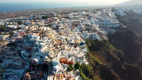 amazing summer sunset in santorini, oia town,cycladic islands, greece