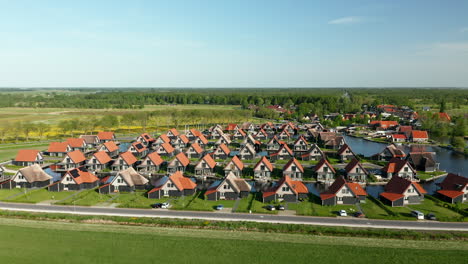 aerial view of detached villas on the waterfront at holiday park waterstaete in overijssel, the netherlands