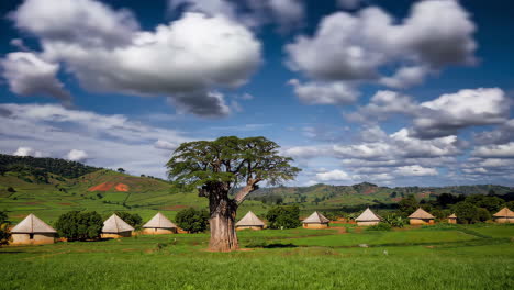 african village landscape under a dramatic sky