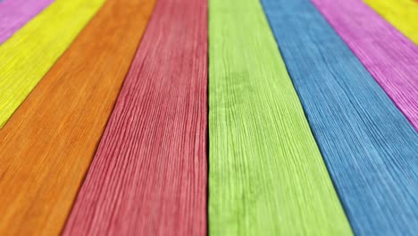 fondo arco iris de tabla de madera vieja con profundidad de campo. bucle sin costuras 3d render