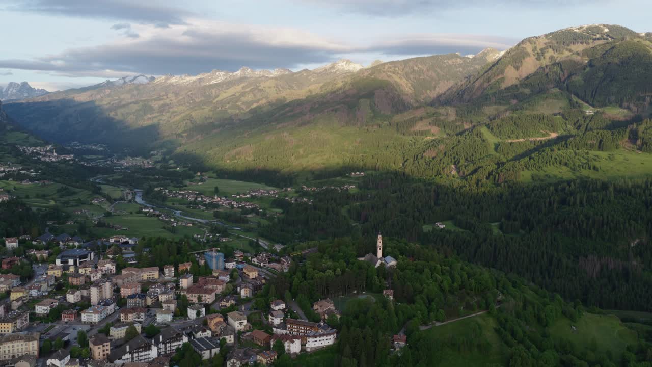 Cavalese Town In The Val di Fiemme In Trentino, Northern Italy - Milano Cortina 2026 Winter Olympics. Aerial Drone Shot