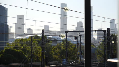 melbourne city eureka tower through train lines