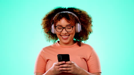Headphones,-smartphone-and-dancing-black-woman