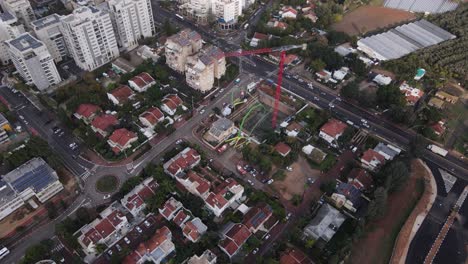 Panoramic-aerial-view-of-skyscrapers-in-construction-with-city-landscape,-Tel-Aviv,-Israel