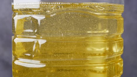 Yellow-sunflower-oil-bottle-on-table