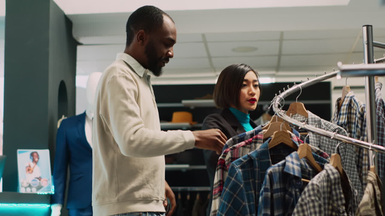 People shopping for clothes in a store