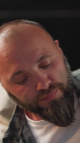 bearded man takes cup with fresh water given by caring wife. male with cardiac disease ready to take effective medications following doctor recommendation closeup